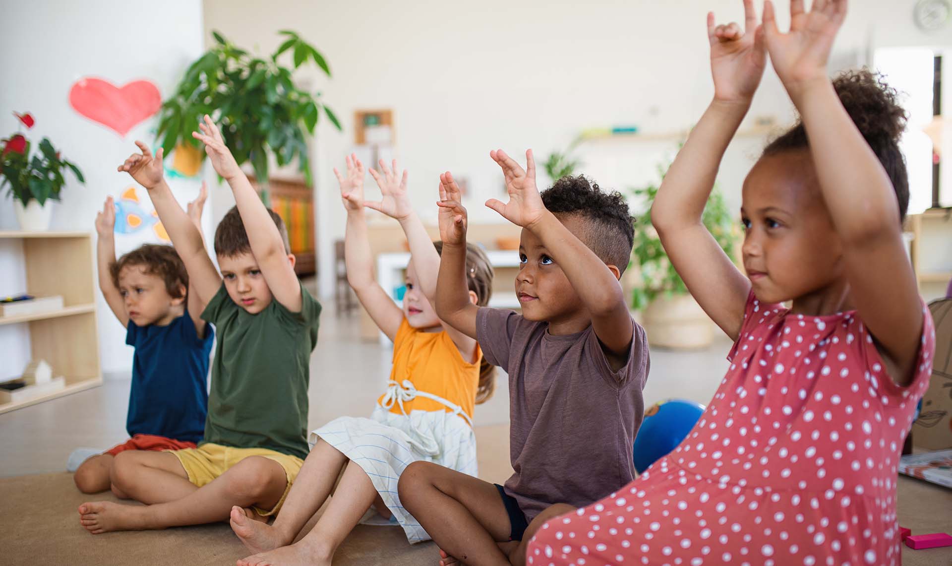 group-of-small-nursery-school-children-sitting-on-2022-01-18-23-39-03-utc
